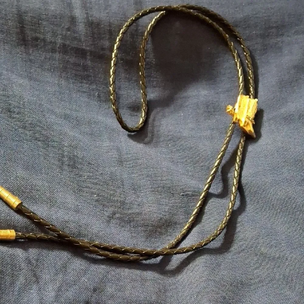 Elegant Black and Gold Bolo Tie Cowboy Boots